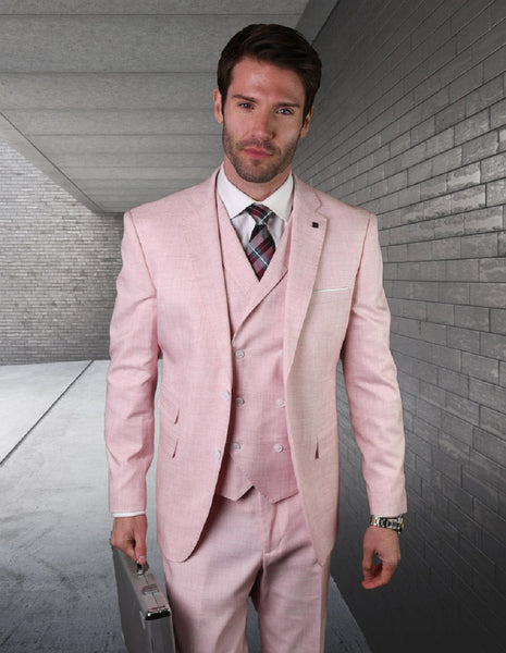 a man in a Slim Fit Suit with Double Breasted Vest in Pink, white shirt and plaid tie